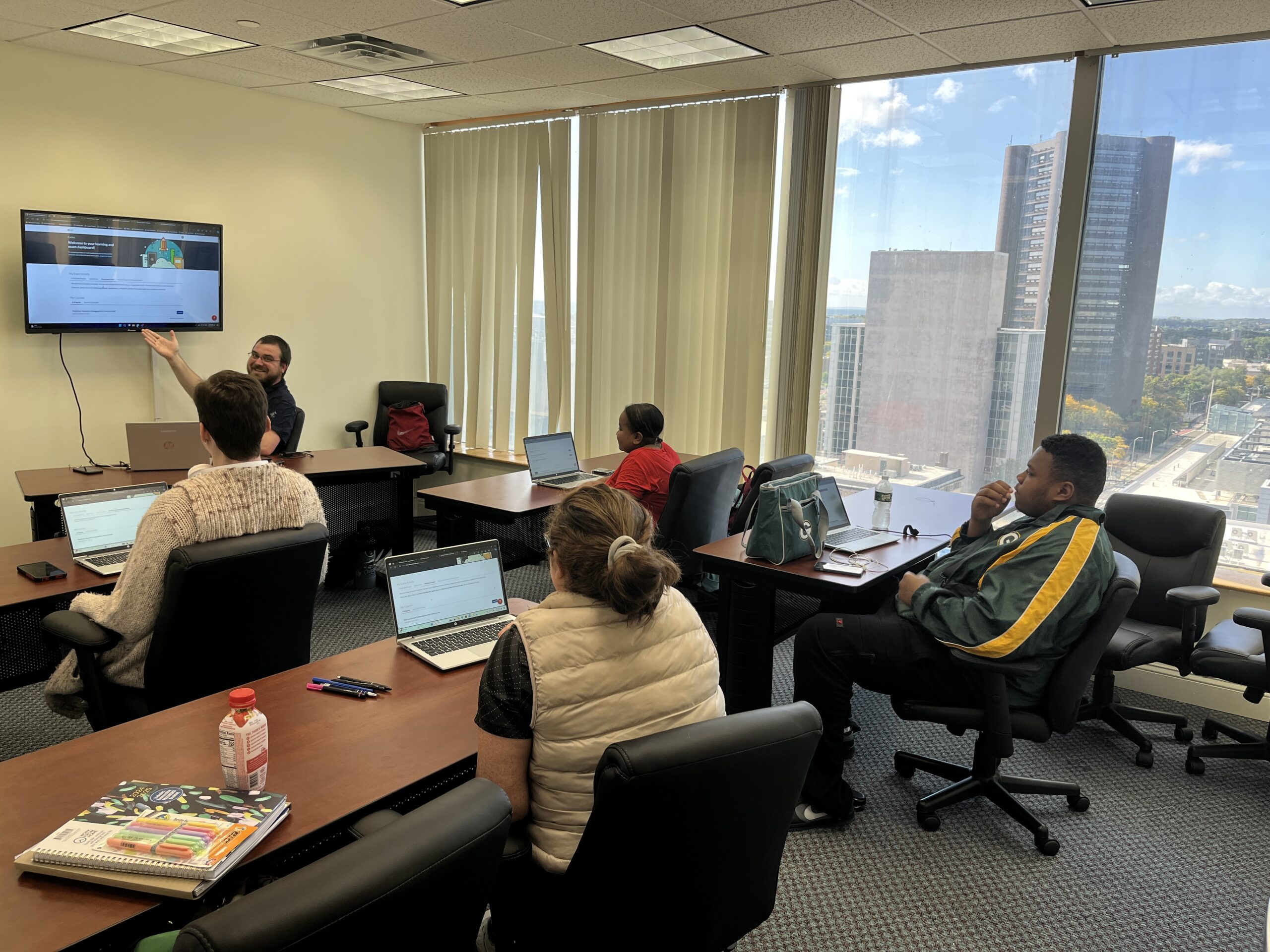 Staff members meeting in the new New Haven office